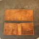 Porte-feuilles en cuir de chèvre